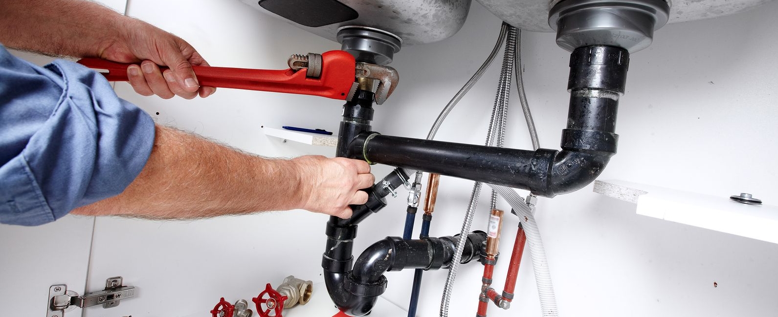 Professional plumber at work